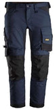 Navy Snickers All Round Slim Fit Work Stretch Tapered Leg Work Trouser - 6341-Snickersonline-trousers Non holster pocket version of Snickers Workwear Stretch 6241 Trousers Snickers Workwear goes street smart in these stretchy work trousers that feature slimmer legs for a clean look. Stretch CORDURA at the knees combined with 4-way stretch at the back provide great flexibility and comfort. 2-way stretch fabric with 4-way stretch panels at back Stretch CORDURA® at knees and crotch KneeGuard