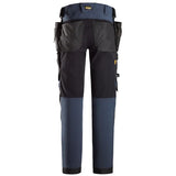 Navy Blue Back Snickers AllroundWork 4-way Stretch Softshell Trousers Holster Pockets-6275 Snickers -Online Snickers Full stretch trousers that feature windproof softshell material and elastic panels,  a combination that provides wind protection, freedom of movement and efficient ventilation. Stretch CORDURA® knees offer added durability and combines with pre-bent legs to ensure optimal fit.