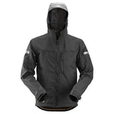Snickers AllroundWork Softshell Jacket with Hood - 1229 Jackets & Fleeces Hardwearing softshell work jacket with a hood built for use all year round. The work jacket is designed to offer dependable working comfort and protection against elements in harsh working environments. Cordura reinforced elbows Pre-bent sleeves Hood for extra protection Reflective details Wind and water protection Size XS-3XL